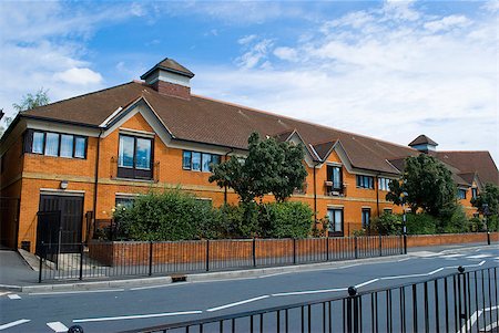 english house facade - traditional brick house in London street with nice blue sky Stock Photo - Budget Royalty-Free & Subscription, Code: 400-04894400