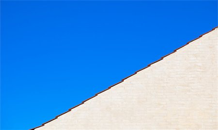 Blue sky, red roof and gable Stockbilder - Microstock & Abonnement, Bildnummer: 400-04894687