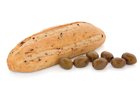 sonnengetrocknet - Olive and sun dried tomato bread with green olives isolated over white background. Stockbilder - Microstock & Abonnement, Bildnummer: 400-04894872