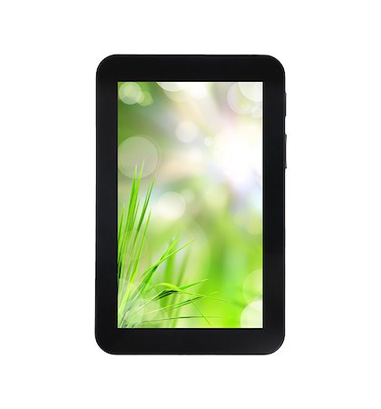 pariwatlp (artist) - fresh grass on tablet PC isolated on white background Fotografie stock - Microstock e Abbonamento, Codice: 400-04895251