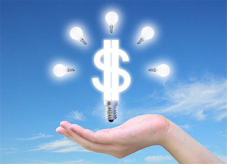 light bulb model of a dollar symbol in women hand on sky Stock Photo - Budget Royalty-Free & Subscription, Code: 400-04895252