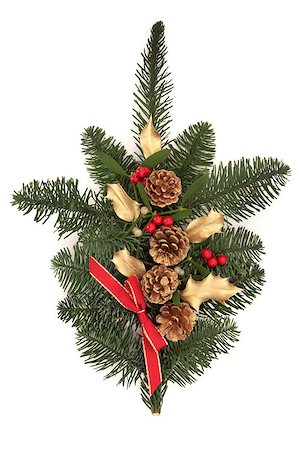 red ribbon and plant - Christmas decoration of mistletoe, gold holly and pine cones, red ribbon and berries with spruce fir leaf sprigs isolated over white background. Foto de stock - Super Valor sin royalties y Suscripción, Código: 400-04895675