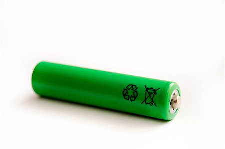 eco travel - Green rechargeable battery isolated on a white background Foto de stock - Super Valor sin royalties y Suscripción, Código: 400-04896097