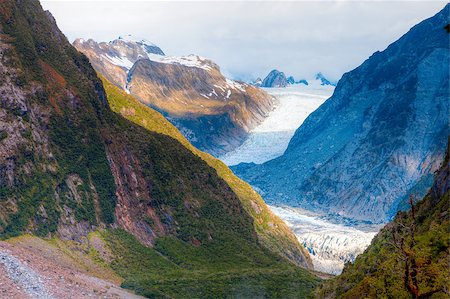 simsearch:400-05383454,k - View of Fox Glacier in the mountains of New Zealand Foto de stock - Royalty-Free Super Valor e Assinatura, Número: 400-04896132