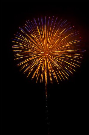 sparking light in sky - Beautiful fireworks exploding over a dark night sky in a grand finale display. Very high resolution. Stock Photo - Budget Royalty-Free & Subscription, Code: 400-04896192