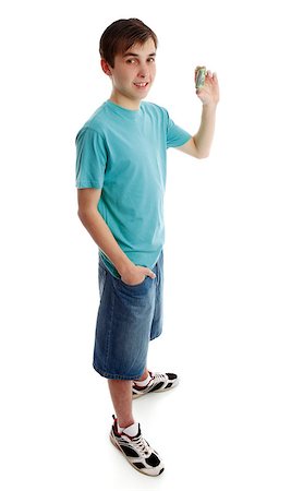 rolled up boy - A boy showing, holding some rolled up money banknotes.  white background. Stock Photo - Budget Royalty-Free & Subscription, Code: 400-04896200