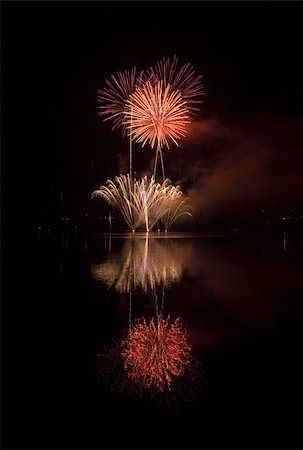 simsearch:400-04419970,k - Colorful fireworks on the black sky background and water reflections Stock Photo - Budget Royalty-Free & Subscription, Code: 400-04896362