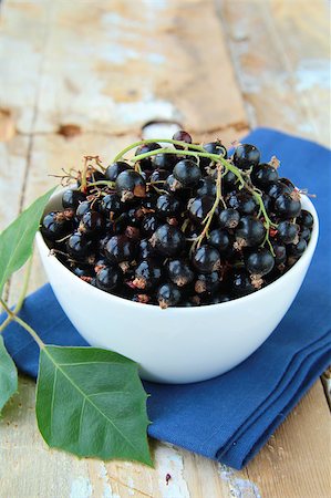 black currants ripe and natural on a wooden table Stock Photo - Budget Royalty-Free & Subscription, Code: 400-04896705