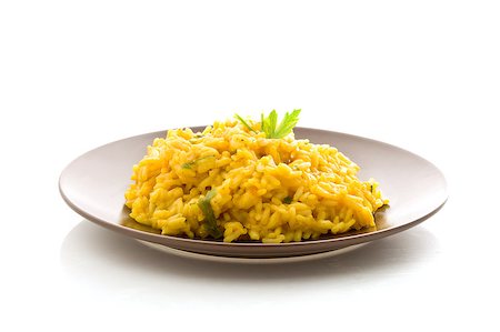 photo of delicious risotto with saffron on isoalated background Stockbilder - Microstock & Abonnement, Bildnummer: 400-04896927