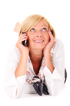 simsearch:400-04895941,k - A picture of a mature woman lying and talking on the phone over white background Fotografie stock - Microstock e Abbonamento, Codice: 400-04897219