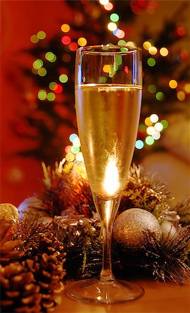 people food - glass of champagne over new year decoration Photographie de stock - Aubaine LD & Abonnement, Code: 400-04897255
