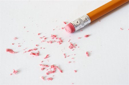 pencils and eraser - A pencil is making corrections by erasing the mistakes. Stock Photo - Budget Royalty-Free & Subscription, Code: 400-04898434