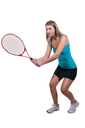 A beautiful woman playing the sports game of tennis Photographie de stock - Aubaine LD & Abonnement, Code: 400-04898545