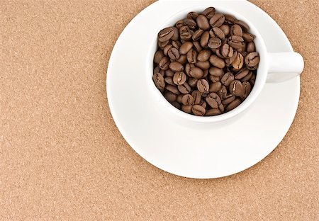 simsearch:400-04604628,k - Coffee cup filled with coffee beans Stockbilder - Microstock & Abonnement, Bildnummer: 400-04898727