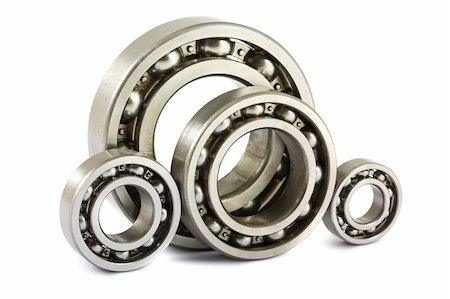 simsearch:400-06891668,k - Four steel ball bearings isolated on a white background Fotografie stock - Microstock e Abbonamento, Codice: 400-04898907