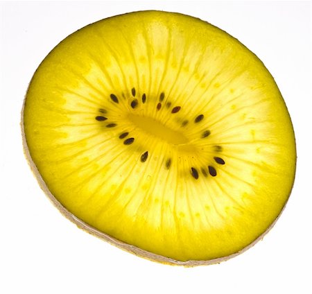 simsearch:400-07251248,k - Gold kiwi slice isolated on white background Foto de stock - Super Valor sin royalties y Suscripción, Código: 400-04898902