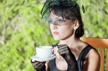 Fashion woman retro portrait in a restaurant Stock Photo - Budget Royalty-Free & Subscription, Code: 400-04899036