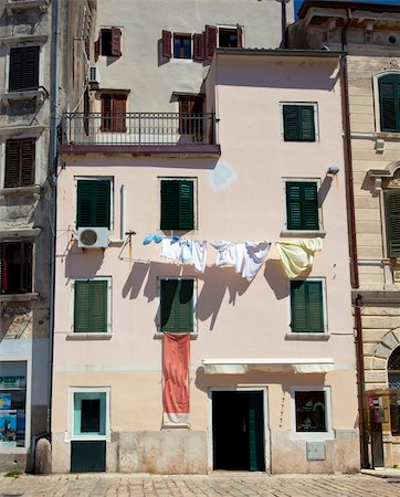 old italian house with laundry Stock Photo - Budget Royalty-Free & Subscription, Code: 400-04899050