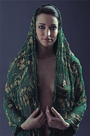 Beautiful women holding green cape around her Stock Photo - Budget Royalty-Free & Subscription, Code: 400-04899656