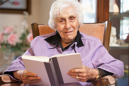 Senior woman reading book Stock Photo - Budget Royalty-Free & Subscription, Code: 400-04890250