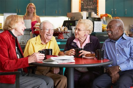 simsearch:400-04890264,k - Senior adults having morning tea together Stock Photo - Budget Royalty-Free & Subscription, Code: 400-04890276