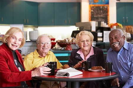 simsearch:400-04890264,k - Senior adults having morning tea together Stock Photo - Budget Royalty-Free & Subscription, Code: 400-04890277