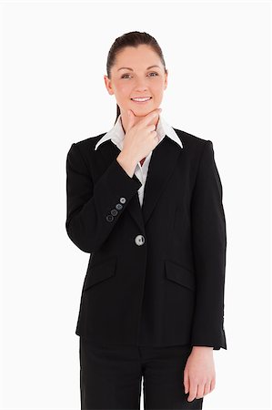 simsearch:400-07464688,k - Cute woman in suit posing while standing against a white background Photographie de stock - Aubaine LD & Abonnement, Code: 400-04890544