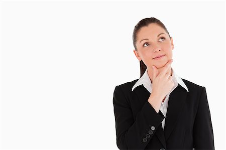 simsearch:400-07464688,k - Charming woman in suit posing while standing against a white background Photographie de stock - Aubaine LD & Abonnement, Code: 400-04890542