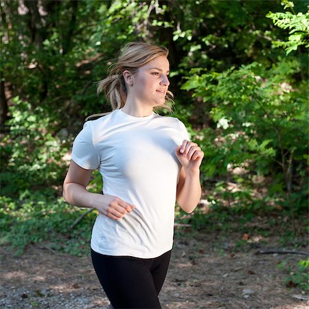 simsearch:400-06768313,k - Attractive young woman on a run in nature Photographie de stock - Aubaine LD & Abonnement, Code: 400-04890779