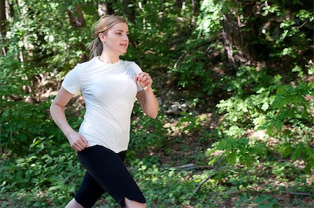 simsearch:400-06768313,k - Attractive young woman on a run in nature Photographie de stock - Aubaine LD & Abonnement, Code: 400-04890785