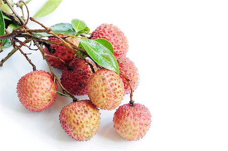 simsearch:400-07629553,k - Fresh red lichi fruits with green leaves on a white background Fotografie stock - Microstock e Abbonamento, Codice: 400-04890862