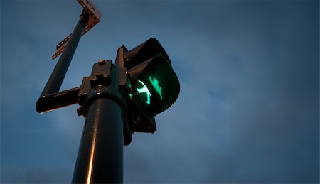 simsearch:400-04314564,k - A traffic light with a green man Photographie de stock - Aubaine LD & Abonnement, Code: 400-04891007