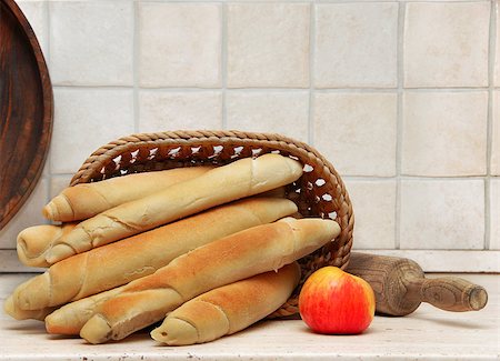 appetizing homemade bread rolled loafs in kitchen Photographie de stock - Aubaine LD & Abonnement, Code: 400-04892000