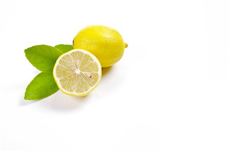 Fresh lemons displayed with a white background Stock Photo - Budget Royalty-Free & Subscription, Code: 400-04892429