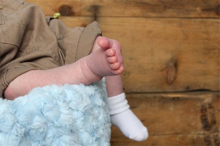 simsearch:400-04235194,k - Newborn baby foot with other foot in sock Stock Photo - Budget Royalty-Free & Subscription, Code: 400-04892762