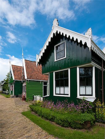 beautiful wooden houses in the Zaanse Schans, north of amsterdam Foto de stock - Super Valor sin royalties y Suscripción, Código: 400-04893018