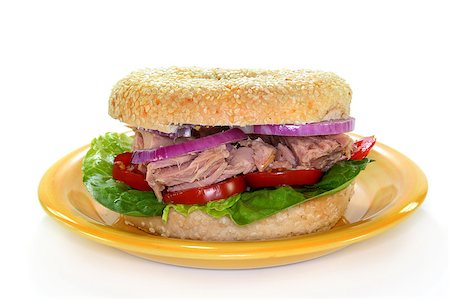simsearch:400-04416282,k - a Bagel topped with tuna, onion and tomato Stock Photo - Budget Royalty-Free & Subscription, Code: 400-04893809