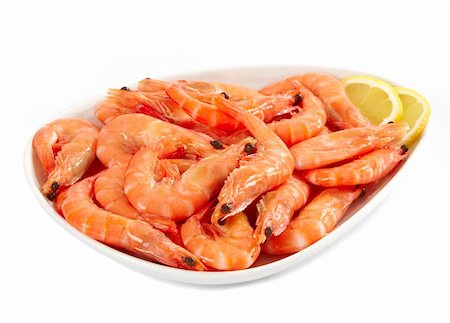 simsearch:400-05939167,k - fresh raw prawns and lemon on a white plate Photographie de stock - Aubaine LD & Abonnement, Code: 400-04904057