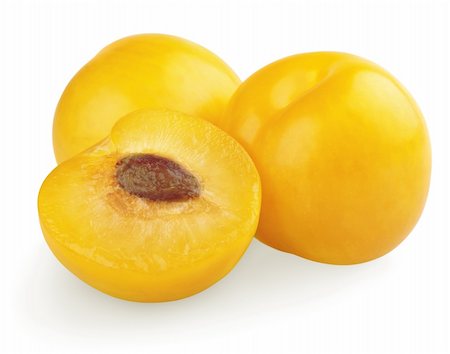 simsearch:400-07675974,k - Yellow plums with half isolated on white background Stock Photo - Budget Royalty-Free & Subscription, Code: 400-04904110