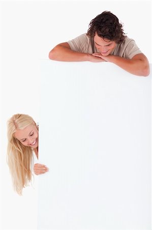 Man and woman looking at a whiteboard in a studio Stock Photo - Budget Royalty-Free & Subscription, Code: 400-04904731