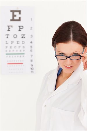 simsearch:400-07630065,k - A female optician with glasses in an office Foto de stock - Super Valor sin royalties y Suscripción, Código: 400-04905153