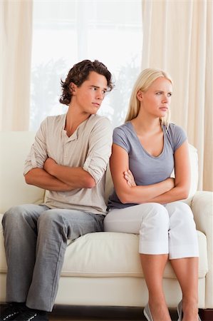 Portrait of a young couple after an argument with the arms crossed Stock Photo - Budget Royalty-Free & Subscription, Code: 400-04905460