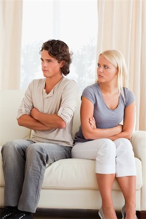 simsearch:400-05350485,k - Portrait of an upset couple after an argument with the arms crossed Photographie de stock - Aubaine LD & Abonnement, Code: 400-04905461