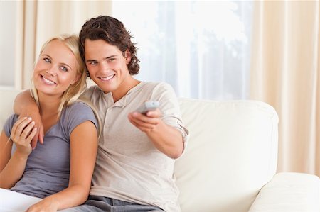 elegant tv room - Couple watching TV in their living room Stock Photo - Budget Royalty-Free & Subscription, Code: 400-04905552
