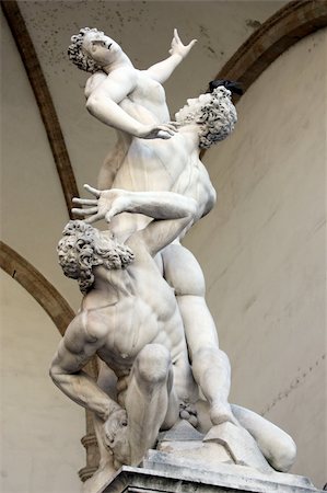 "Abduction of the Sabine Virgins" a marble sculpture group created in 1585 by the Flemish sculptor known by his Italian name Giambologna.  The sculpture is Signoria's square in the lobby "Loggia dei Lanzi", in Florence (Italy) Stock Photo - Budget Royalty-Free & Subscription, Code: 400-04906413