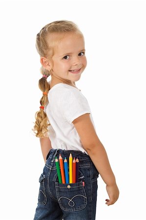 Little girl with colored pencils in back pocket going back to school - isolated Stock Photo - Budget Royalty-Free & Subscription, Code: 400-04907039