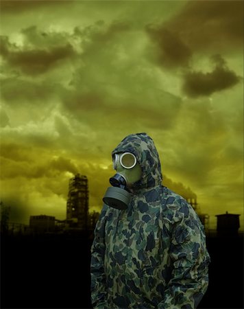 the man in anti-gas mask on a factory background Stock Photo - Budget Royalty-Free & Subscription, Code: 400-04907070