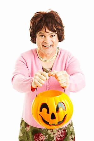 Man dressed as woman, trick-or-treating on Halloween.  Isolated on white. Stock Photo - Budget Royalty-Free & Subscription, Code: 400-04907420