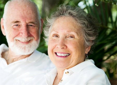 simsearch:400-04109826,k - Portrait of a happy senior woman with her loving husband in background. Fotografie stock - Microstock e Abbonamento, Codice: 400-04907423