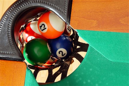 simsearch:400-09064481,k - balls in billiards table leather pockets closeup from above Stockbilder - Microstock & Abonnement, Bildnummer: 400-04907751